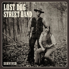 Picture of Survived (Standard) (LP)  by Lost Dog Street Band