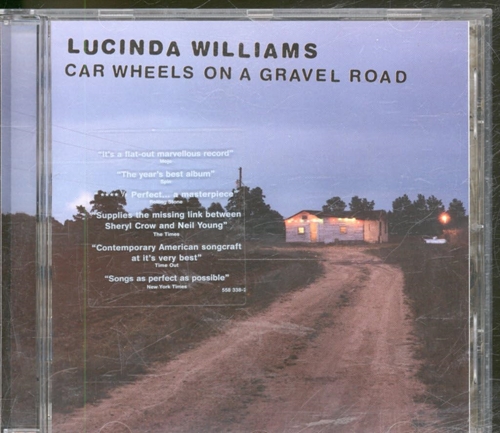 Picture of CAR WHEELS ON A GRAVEL ROA  by WILLIAMS LUCINDA